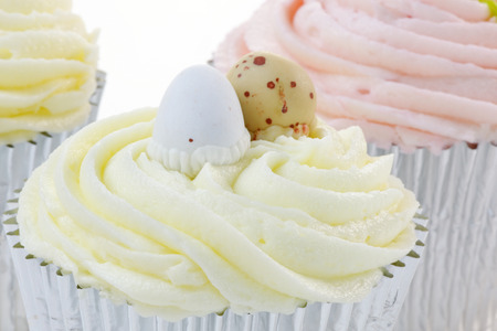 Close up of a cupcake with egg decoration