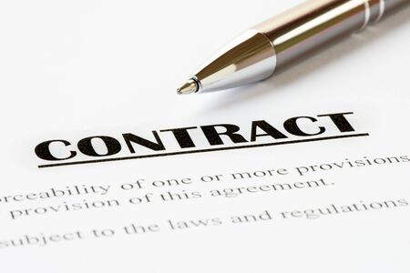Close up of a contract ready to be signed.With pen.Office,legal concept.の写真素材