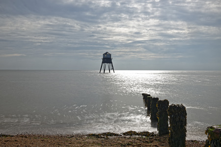 An old lighthouse on the coast at Dovercourt,Essex,UKの写真素材