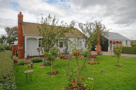 A traditional wooden seaside holiday cottage in the UKの写真素材