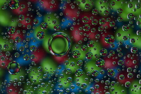 Candies in water droplets.