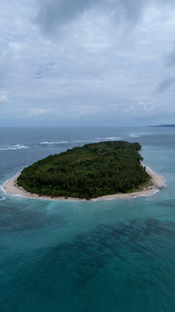 Aerial view of white waves coming to Cayo Zapatilla shore. Bocas del Toro archipelago, Panama,...