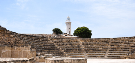 A lighthouse viewed from ancient ruins in Paphosの写真素材