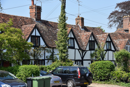 Sutton Courtney, United Kingdom - May 07 2018:   A row of Tudor style cottagesのeditorial素材