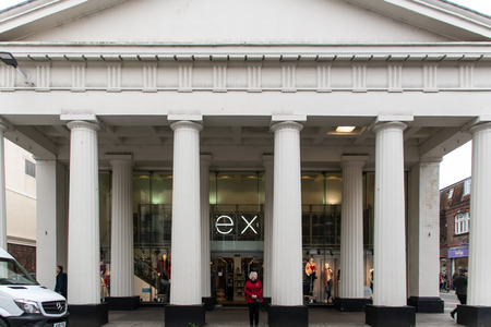 Chichester, United Kingdom - October 06 2018:   The imposing Roman Style frontage of Next fashion shop, formerly the Corn Exchange, in East Streetのeditorial素材