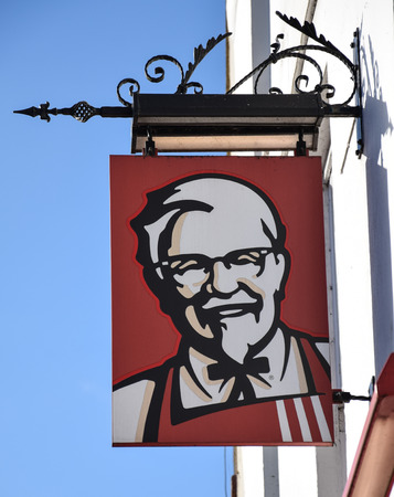 Banbury, England - November 29 2017:   A Hanging Sign for a KFC restaurant in Market Place, Banburyのeditorial素材