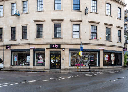Bath, United Kingdom - October 13 2018:   The frontage of Sally beauty product and accessory store on James Street Westのeditorial素材