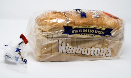 Reading, United Kingdom - September 29 2018:   A pre-packaged loaf of white sliced bread made by Warburtonsのeditorial素材