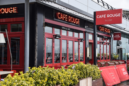 Brighton, United Kingdom - March 28 2018:   The Frontage and entrance to Cafe Rouge coffee shop and restaurant at Brighton marinaのeditorial素材