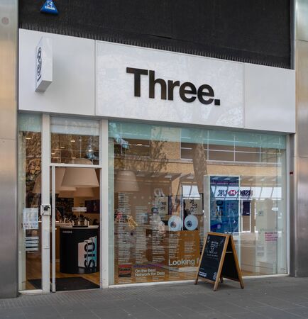 Swindon, United Kingdom - May 04 2019:   The Frontage of Three Mobile phone store in Canal Walkのeditorial素材