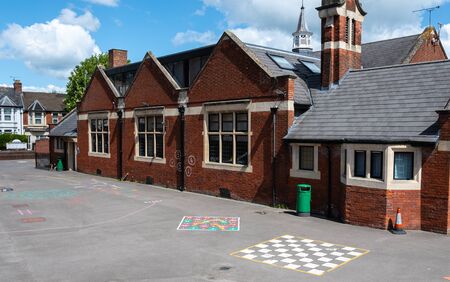 Games marked on the concrrete floor of the playground outside Holy Rood primary schoolのeditorial素材