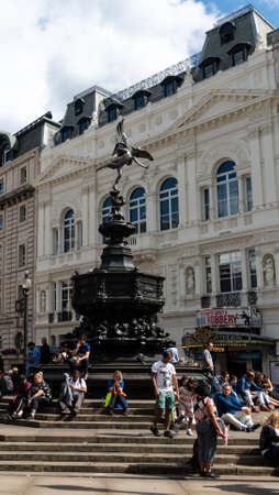 London, United Kingdom - August 18 2019:  The Shaftesbury Memorial Fountain statue of Anteros, often called Eros, by Alfred Gilbert, in the centre of Picadilly Circusのeditorial素材