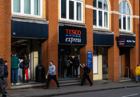 Guildford, United Kingdom - November 06 2019:   The entrance to the Tesco Express store on Bridge...