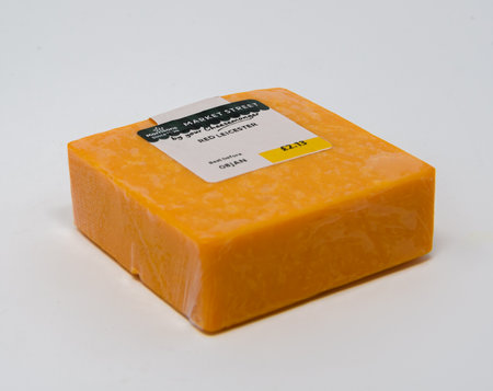 Reading, United Kingdom - December 20 2020:  A piece of Morrisons Red Leicester cheeseのeditorial素材
