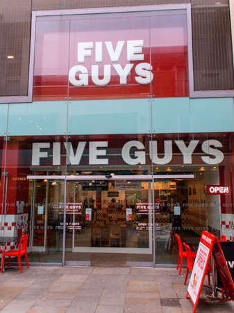 Guildford, United Kingdom - November 06 2019:   The Entrance to Five Guys restaurant on Friary Stのeditorial素材