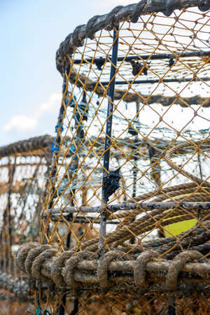 A close up of lobster traps at Torquay docks