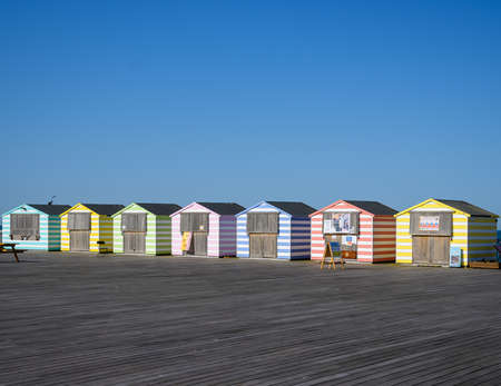 Hastings, United Kingdom - July 31 2020:  Colourful pier Huts along Hastings Pierのeditorial素材