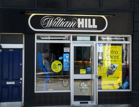 London, United Kingdom - July 30 2020:  The frontage of William Hill Bookmakers in Buckingham Palace Roadのeditorial素材