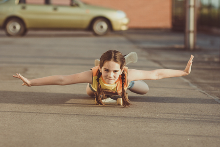 a child riding a skateboardの写真素材