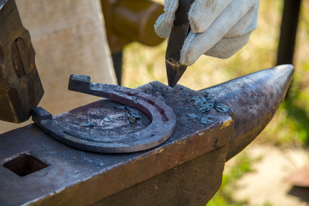 Blacksmith works in a Retro smithy