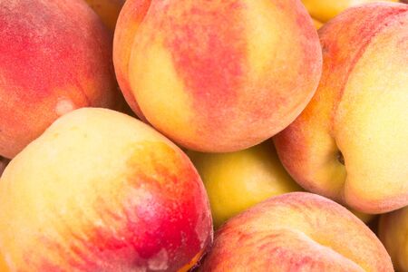 ripe fruit fresh peaches, close up photoの写真素材