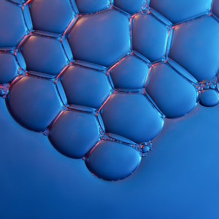 foam texture soap bubbles on the water abstract background