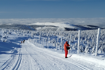 Winter landscape of Jeseniky mountains with the upper reservoir of pumped storage power plant Dlouhe Strane, Czech Republic in the background  の写真素材