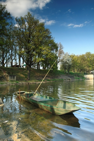 Fishing Boat near the Dam of the Pond Rozmberkの写真素材