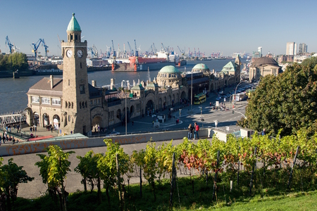 Famous Hamburger Landungsbruecken with commercial harbor and Elbe river, St. Pauli district, Hamburg.の写真素材