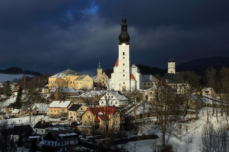 Winter view of the town of Branna, a small town with beautiful renaissance church and castle in the Jeseniky mountains, Czech Republic.のeditorial素材