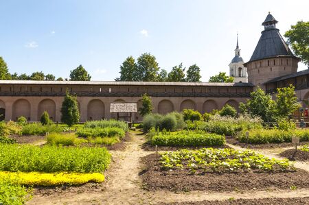 Walls, towers and garden in an Orthodox monasteryの写真素材