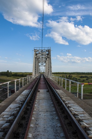 Large railway bridge at the intersection of railway linesの写真素材