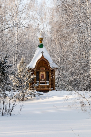 An old orthodox church in winter landscapeの写真素材
