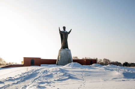 the statue of St  Nicholas in a snowy fieldの写真素材