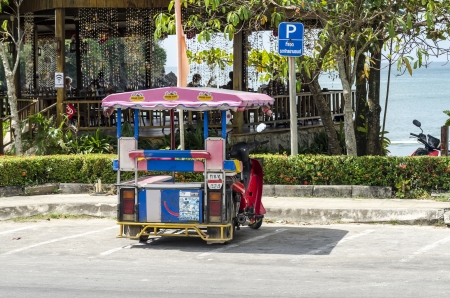 traditional Tuk Tuk taxi on the streets of Nang Krabi Thailandのeditorial素材