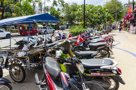parking motorbikes for rent in the streets of Nang Krabi Thailandのeditorial素材