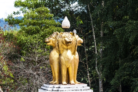 Buddhist sculptures of mystical creature in the interior of a Buddhist temple in Thailandの写真素材