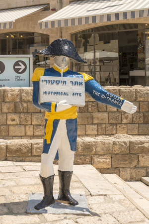 The streets of Tel Aviv. A pointer in the form of the figure of Napoleonの写真素材