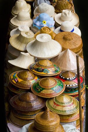 Natural straw hats on the boat.の写真素材