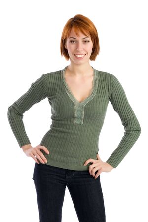 Happy beautiful young woman with hands on hip, isolated on white background.の写真素材
