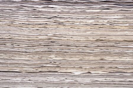 Pile of newspapers texture, ready for recycling.の写真素材