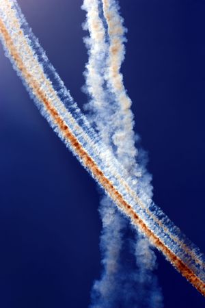 Abstract high contrast cloud traces left by goup of airplanes.