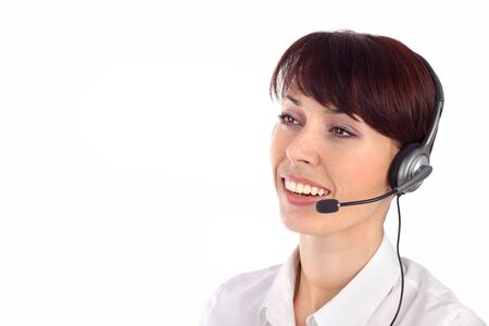 Female customer service representative smiling, isolated on white background.の写真素材