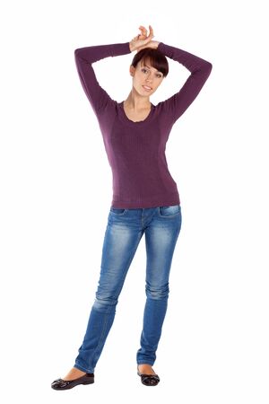 Young pretty woman in casual clothing, isolated over a white background.の写真素材
