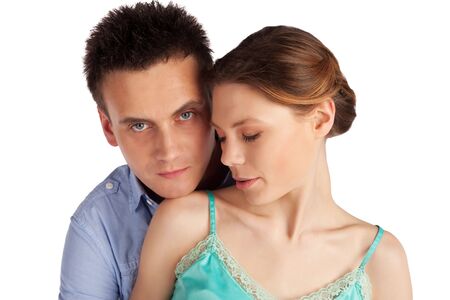 Beautiful young  couple tender love portrait isolated on white backgroundの写真素材