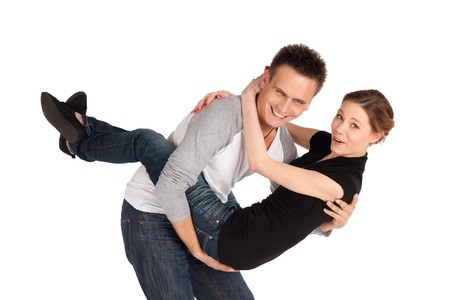 Young cheerful happy couple fun woman embracing man isolated on white background