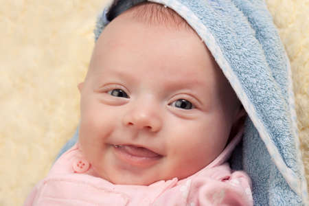 Portrait of a smiling happy beautiful little baby girl