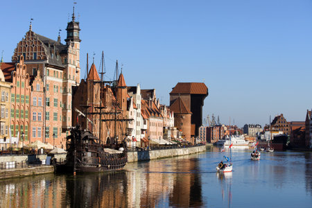 Picturesque scenery in the Old Town of Gdansk (Danzig) in Poland with Motlava river and the Crane on...