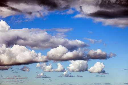 Fluffy cumulus clouds on a tranquil day interesting pattern