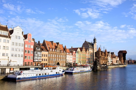 Picturesque waterfront scenery by the Motlawa river in the Old Town of Gdansk in Poland, composition with copyspaceの写真素材
